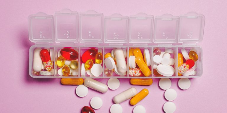 Canva-Clear-Plastic-Container-and-Medicine-Capsule-scaled-2560×1280