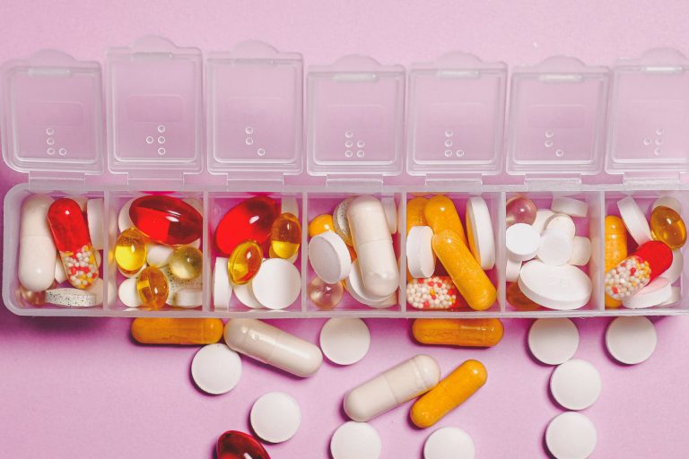 Canva-Clear-Plastic-Container-and-Medicine-Capsule-scaled-2560×1280