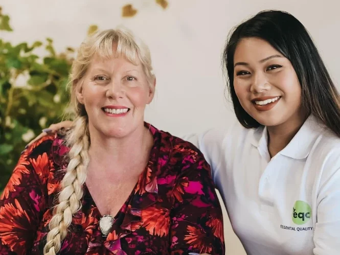 EQC nurse with and old lady