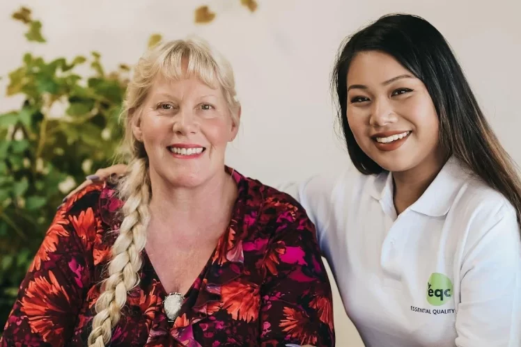 EQC nurse with and old lady EQC nurse with and old lady