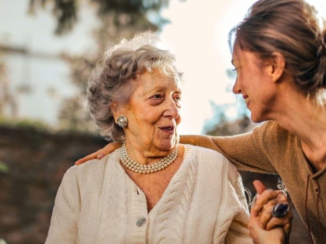 Old lady talking to Home care nurse