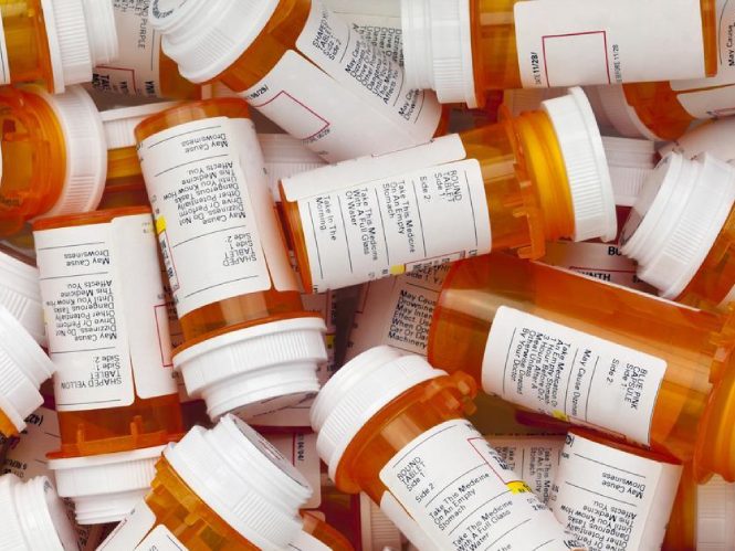 a picture of dozens of medicine bottles