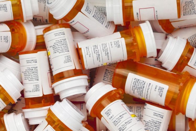 Pharmacist-homecare a picture of dozens of medicine bottles