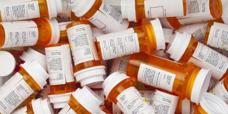 Pharmacist-homecare a picture of dozens of medicine bottles