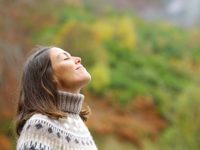 Young lady breathing fresh air