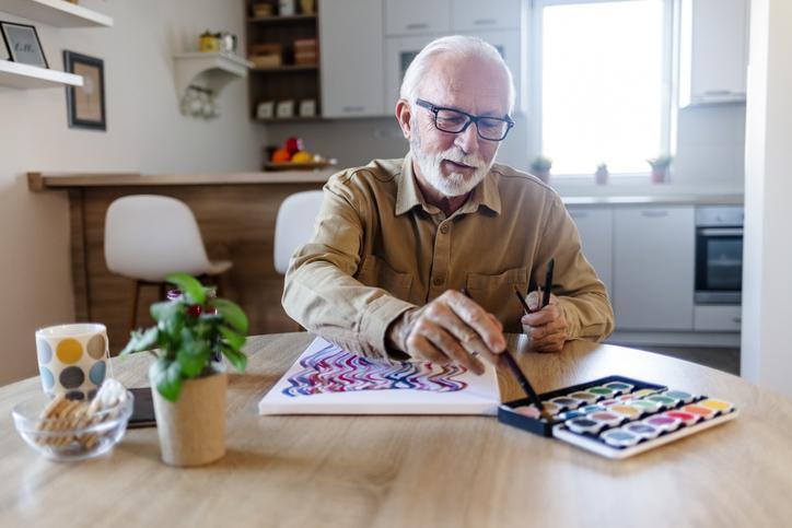 Occupational Therapy Benefits Old man painting