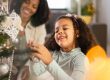 A very happy kid is celebration for joyful Christmas tree for holidays