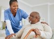 Private duty nurse having a laugh with an old man