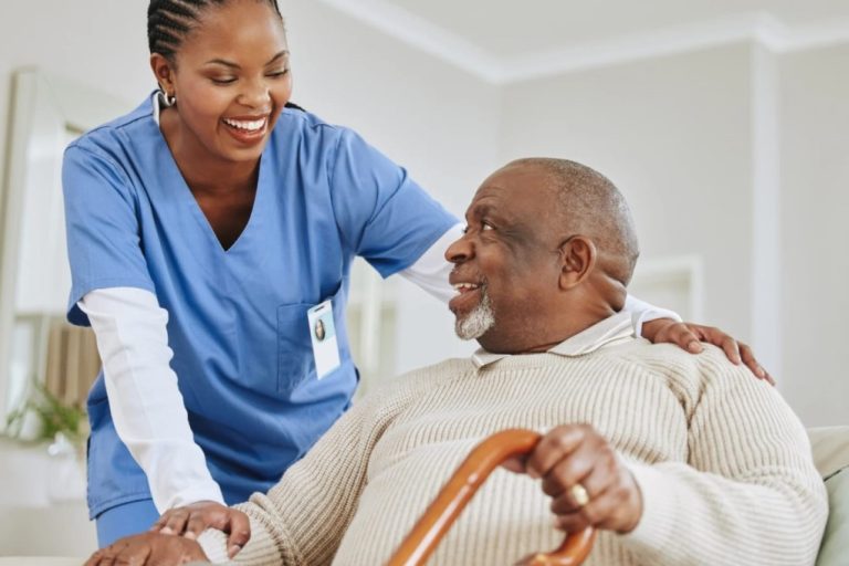 Private duty nurse having a laugh with an old man