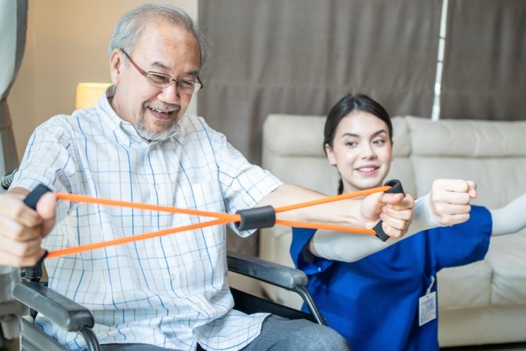 Occupational Therapy for Seniors – june blog Caregiver girl instructing an old man with stretching exercise
