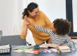 Teacher and kid doing high five